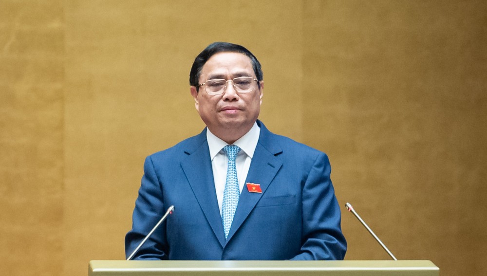 Thủ tướng Phạm Minh Chính trình bày Báo cáo giải trình, làm rõ thêm một số vấn đề được các đại biểu Quốc hội quan tâm - Ảnh: Quốc hội.
